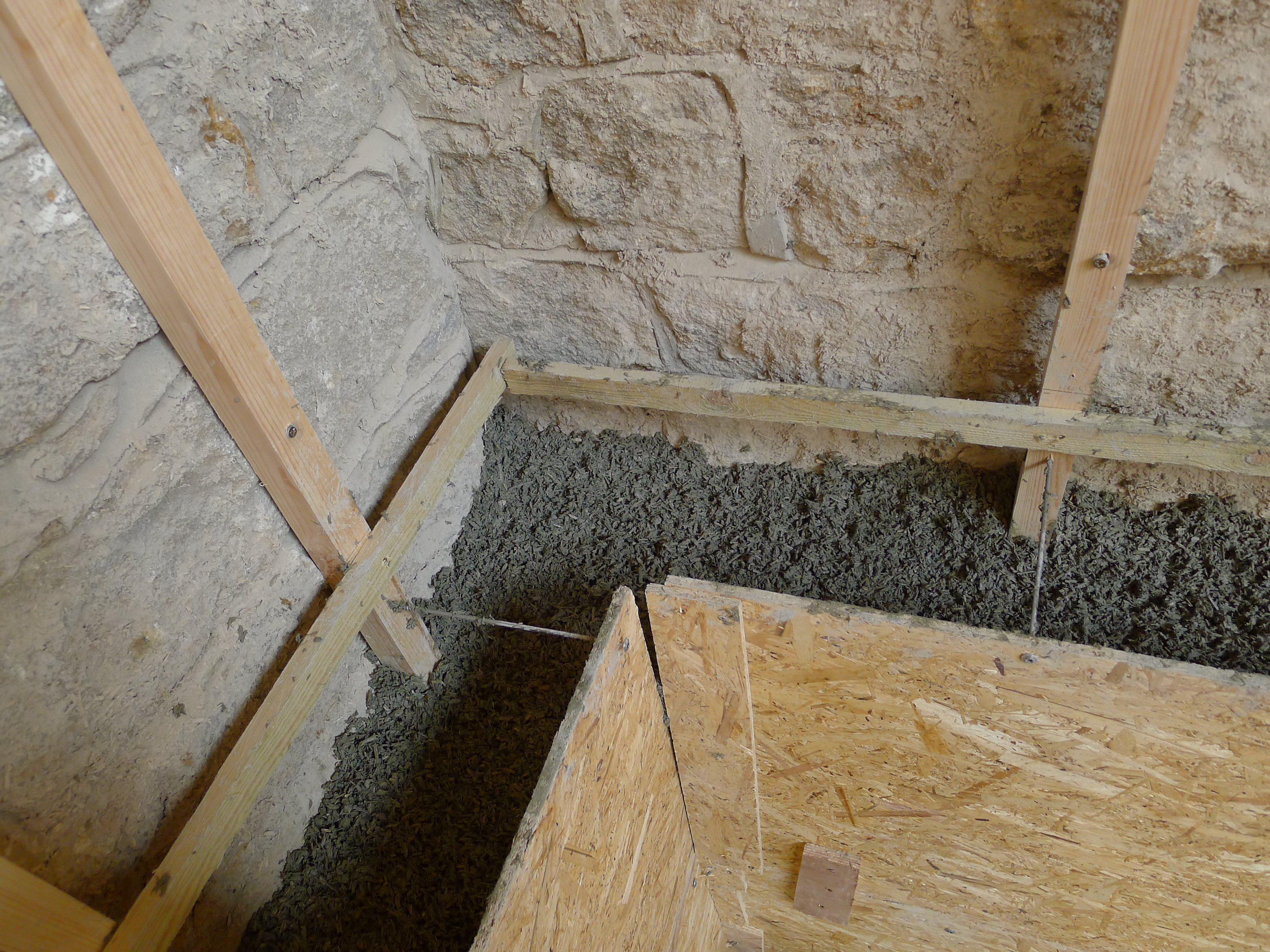 corner junction of hempcrete internal solid wall insulation against solid stone walls with timber battens
