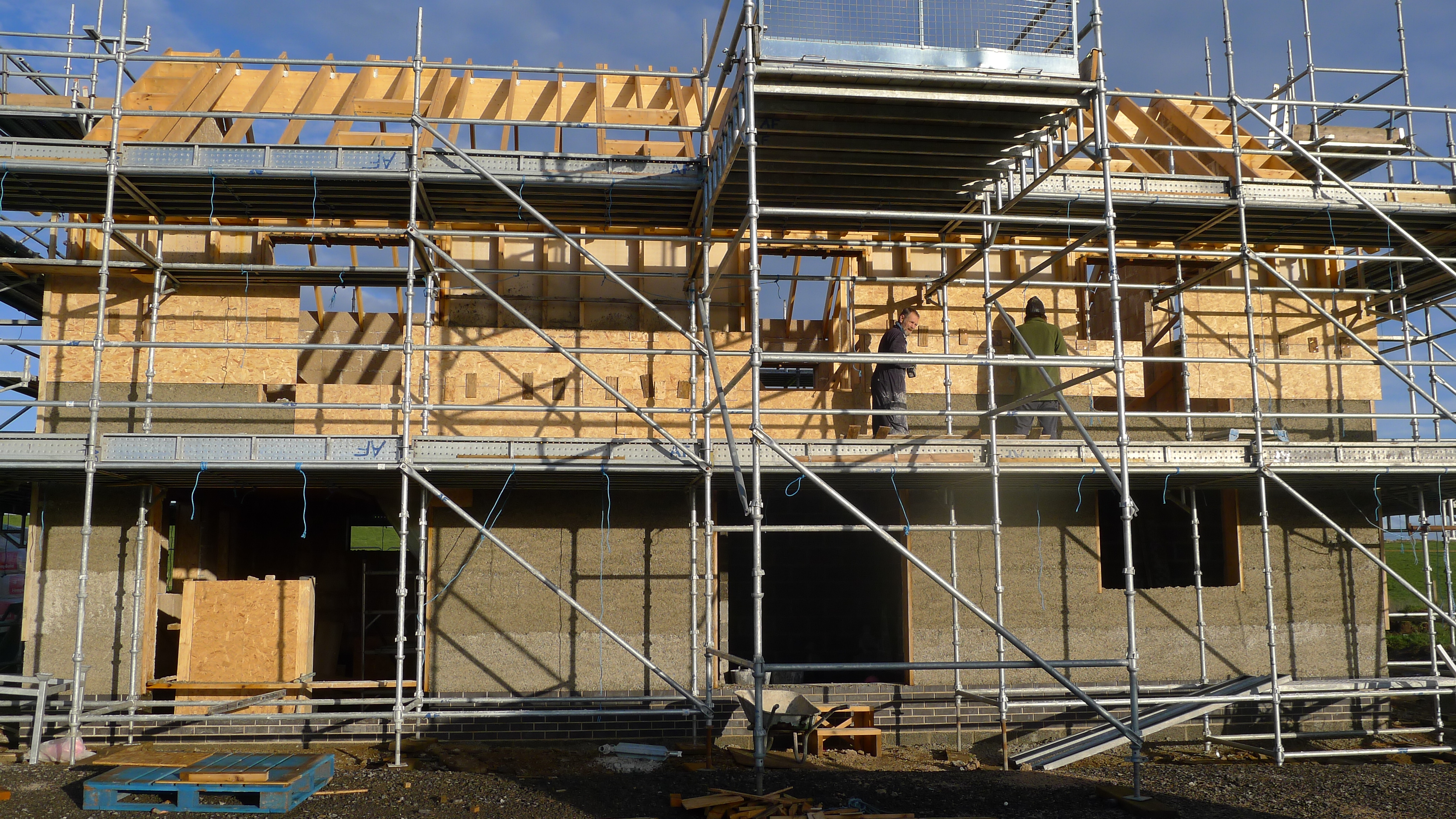new build hempcrete construction with timber frame in Scotland with scaffolding surrounding